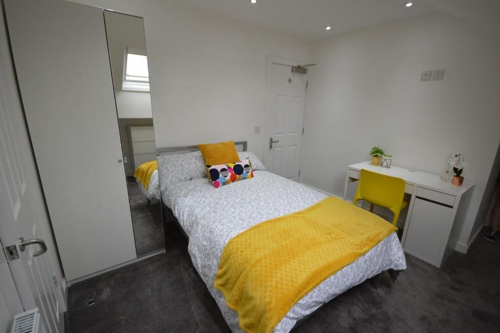 Bright and inviting double bedroom featuring a ...