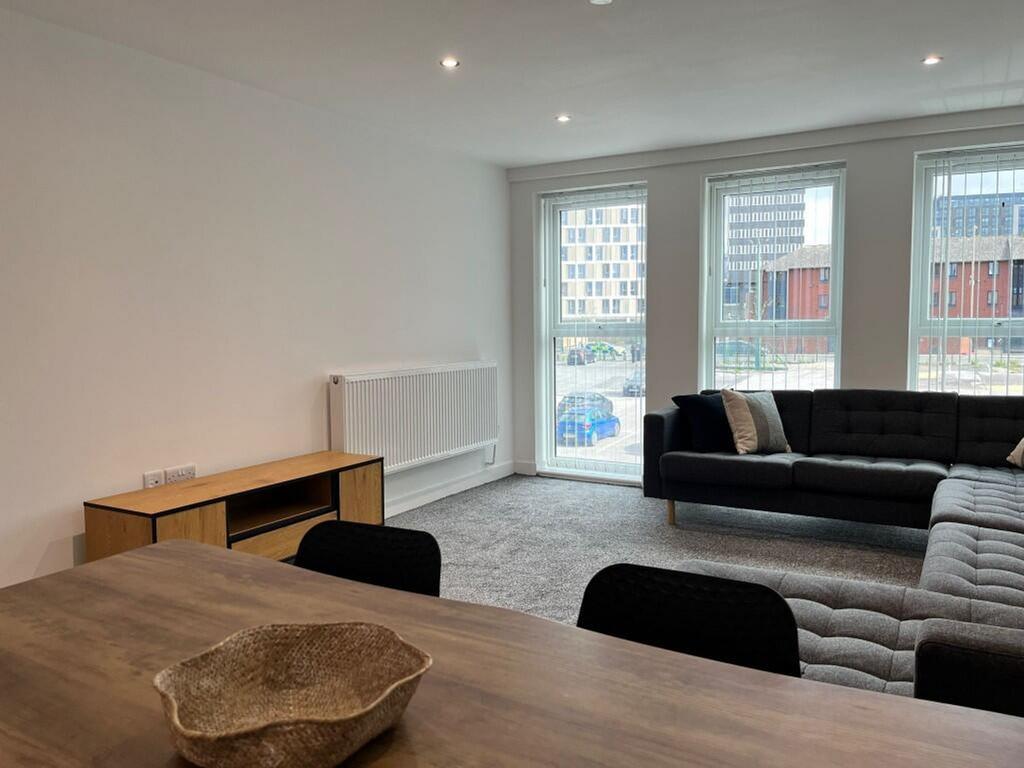 A spacious and inviting large modern living roo...