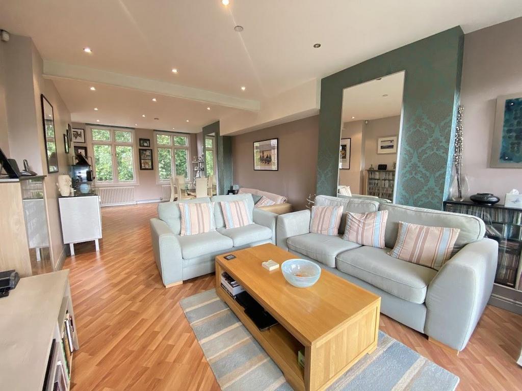 Open plan living dining room + lobby area