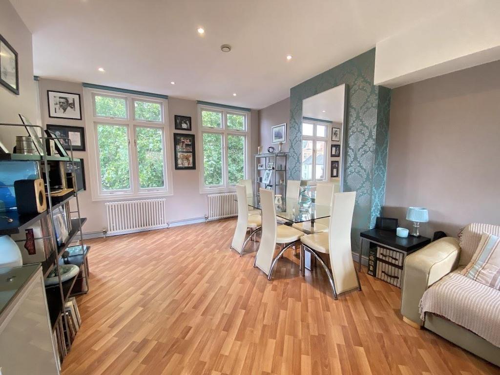 Open plan living dining room + lobby area