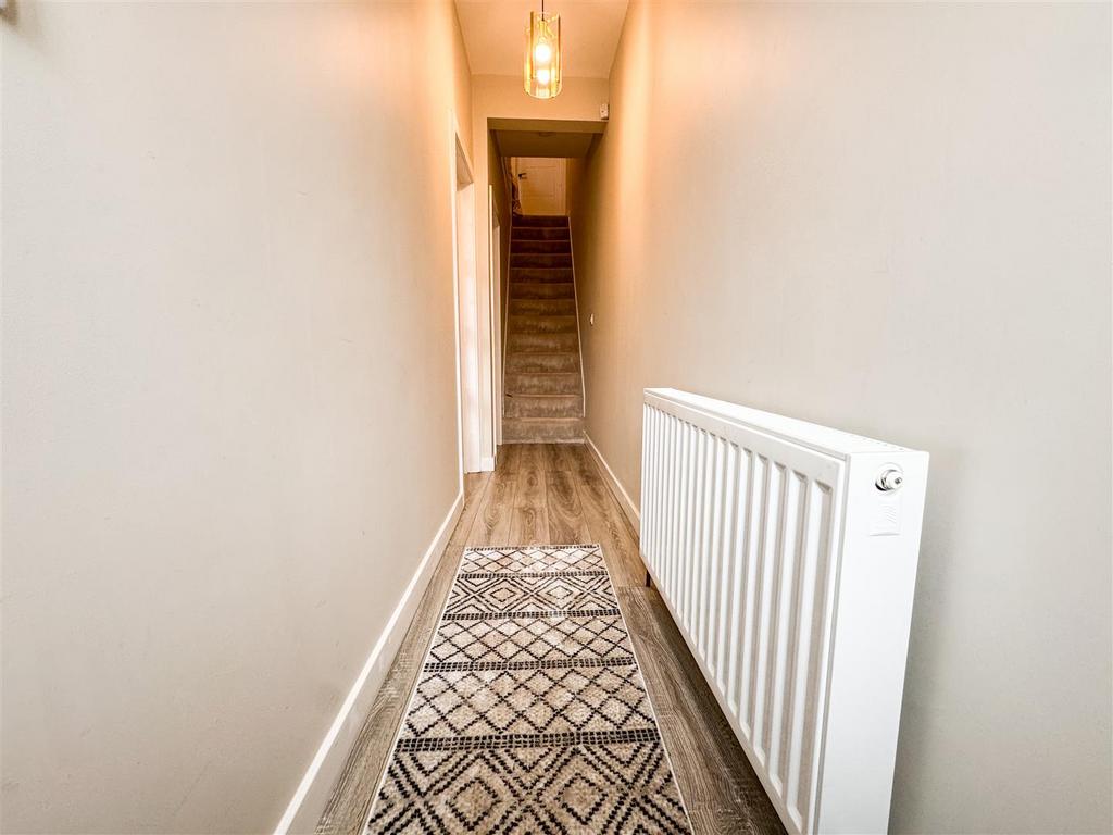 Stairs rising to the first floor