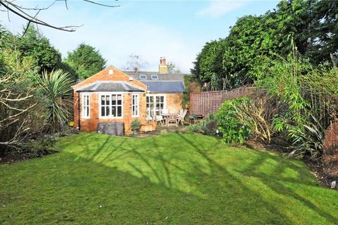 3 bedroom bungalow for sale, Wellesley Cottage, 2 Trumpsgreen Road, Virginia Water, Surrey, GU25 4HL