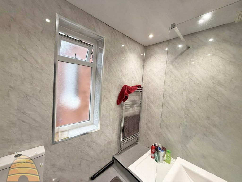 A modern and clean bathroom featuring elegant m...