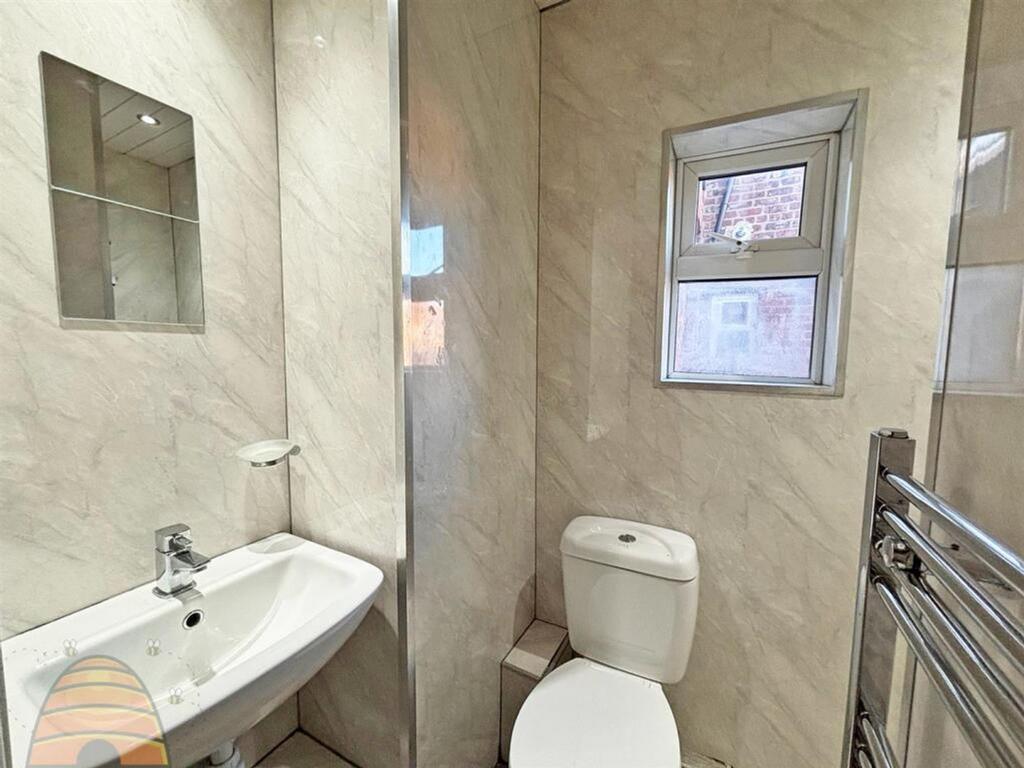 A modern and clean bathroom featuring stylish f...