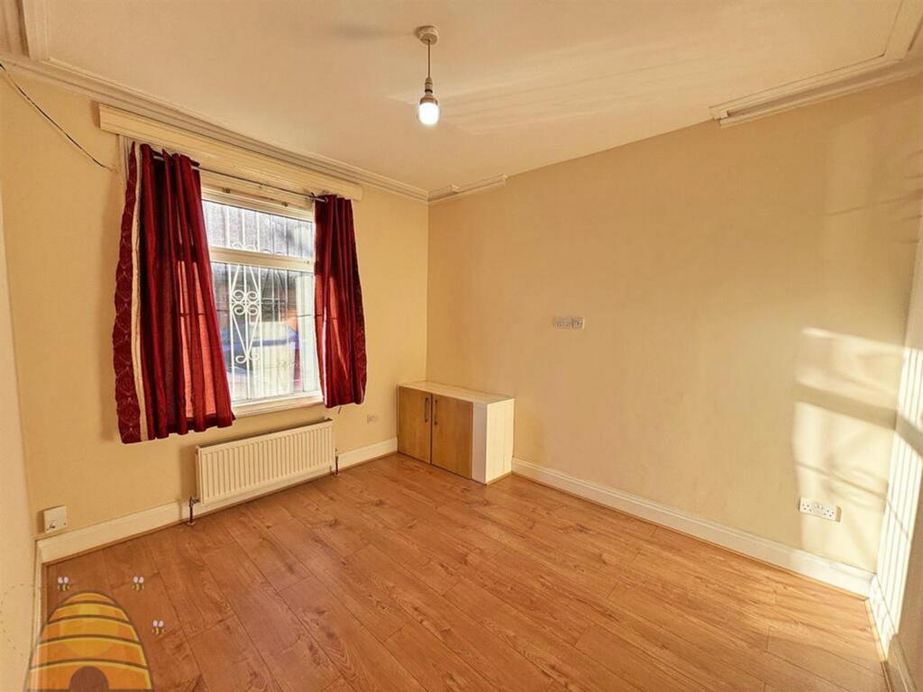 A bright and tidy double bedroom with ample nat...