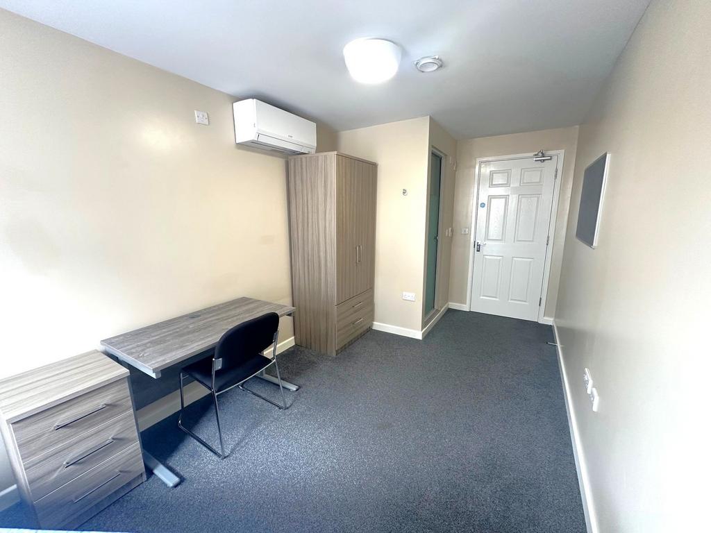 Neat, modern single bedroom with a study area, ...
