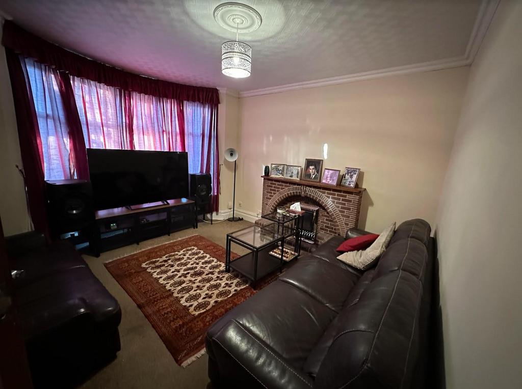 A cozy living room featuring comfortable seatin...