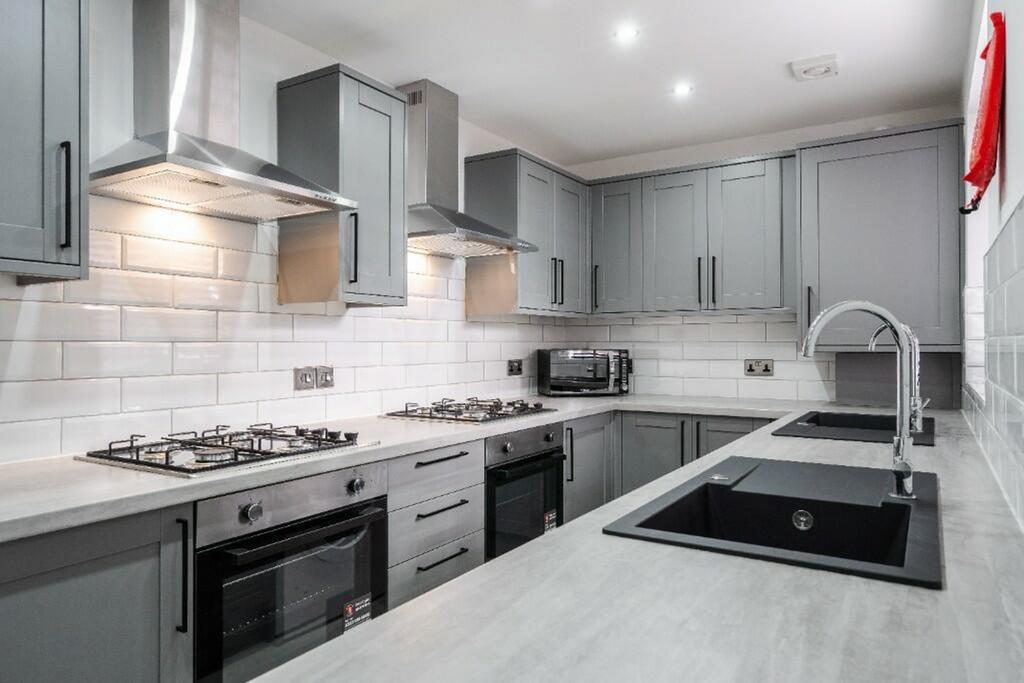 A modern and well-maintained kitchen featuring ...