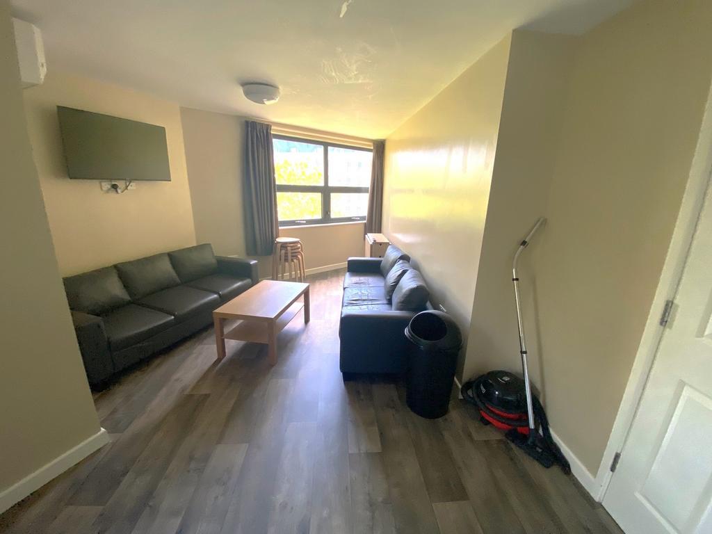 This inviting living room features a spacious l...