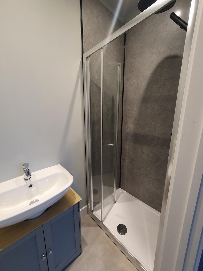 A modern and clean bathroom featuring a stylish...