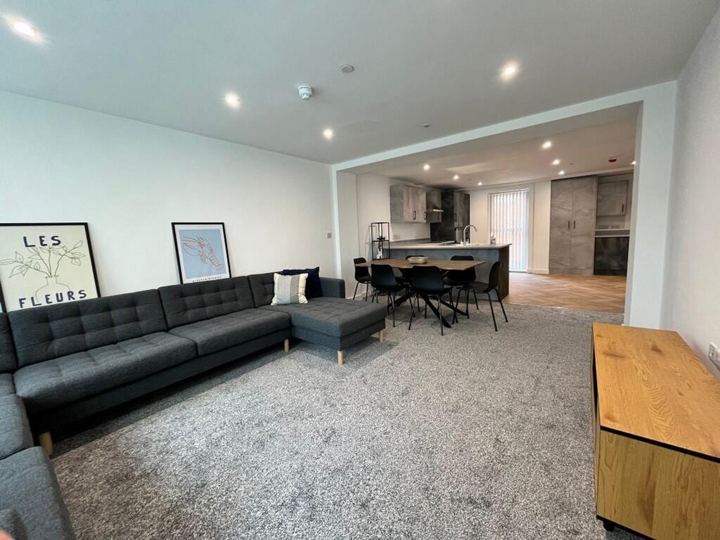 A spacious and stylish modern living room, perf...