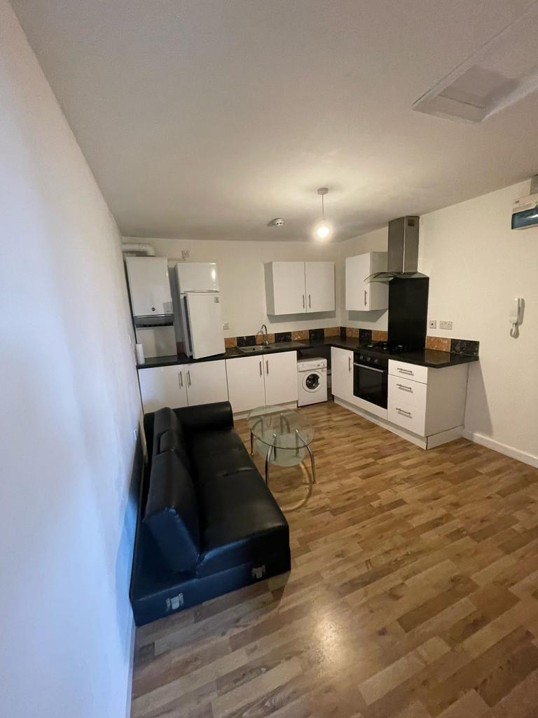 Modern kitchen with ample storage, equipped wit...