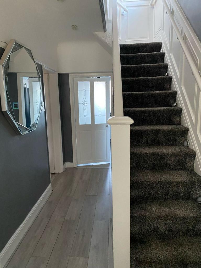 Entrance hallway and stairs to upper level