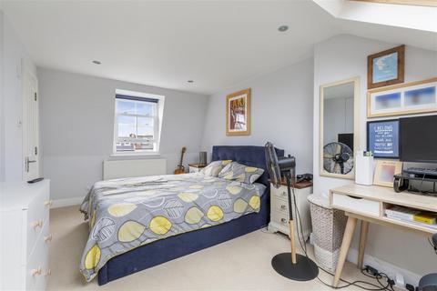 21 Tolverne Road, London, SW20 8RA