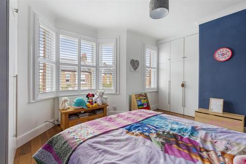 21 Tolverne Road, London, SW20 8RA