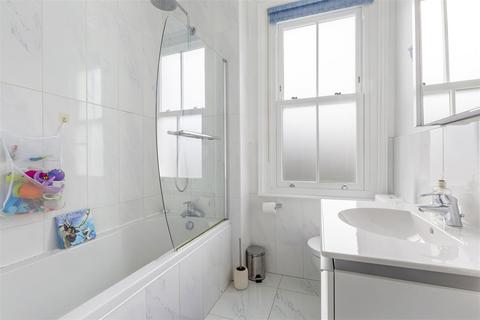 21 Tolverne Road, London, SW20 8RA