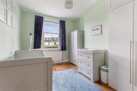 21 Tolverne Road, London, SW20 8RA