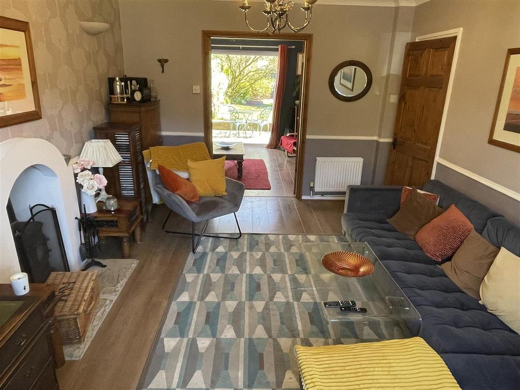 Sitting Room through to Garden room.JPG