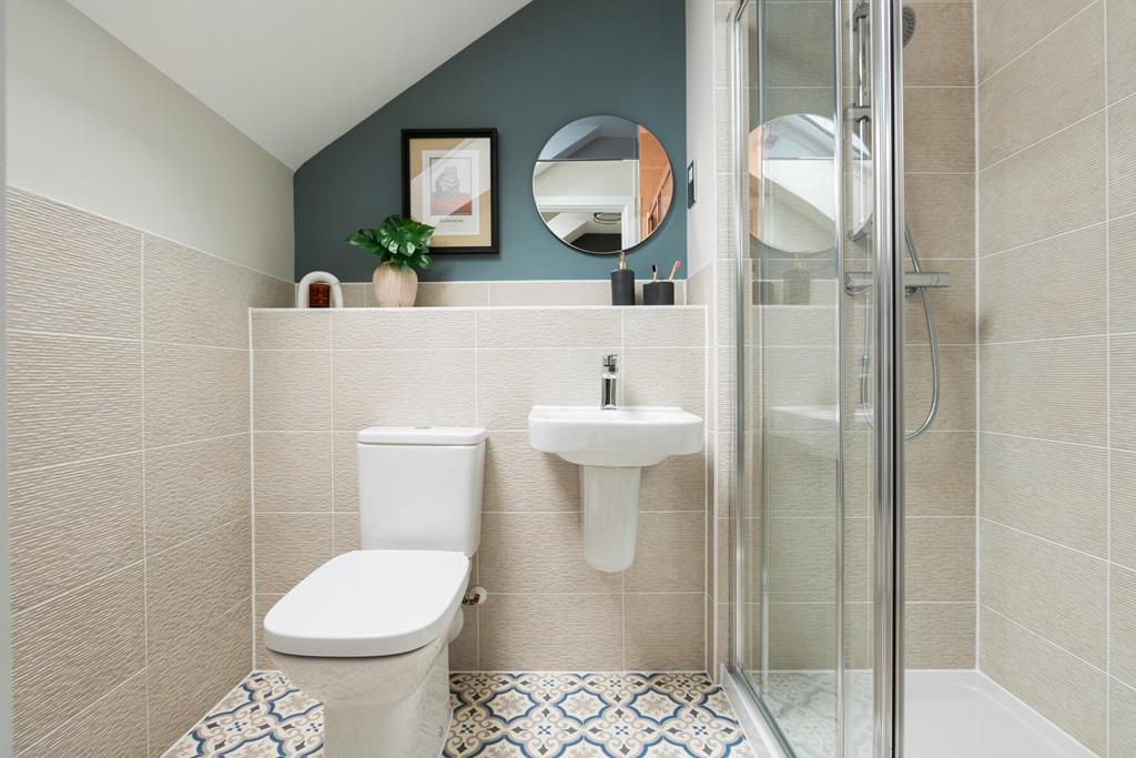Bedroom 1 also hosts a private en-suite shower...