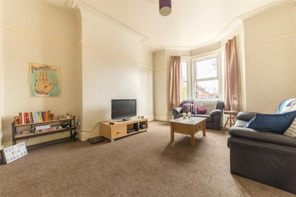 A spacious and inviting large modern living roo...