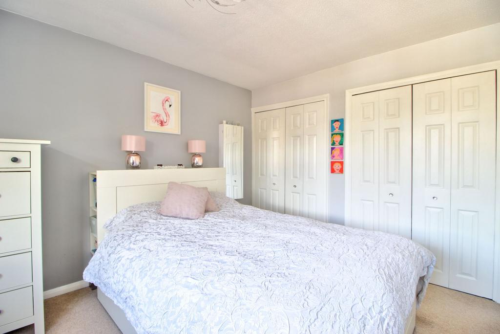 Bedroom One with plenty of storage