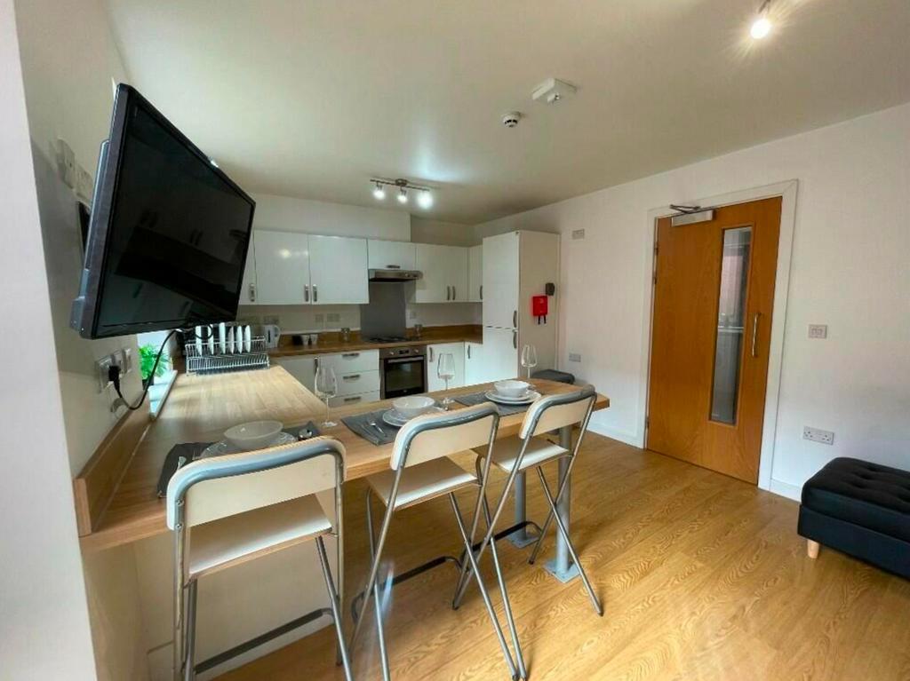 A modern and clean kitchenette with ample space...