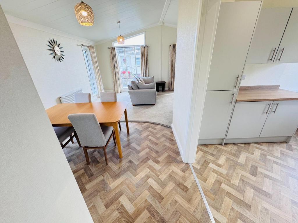 DINING INTO KITCHEN &amp; SITTING AREA