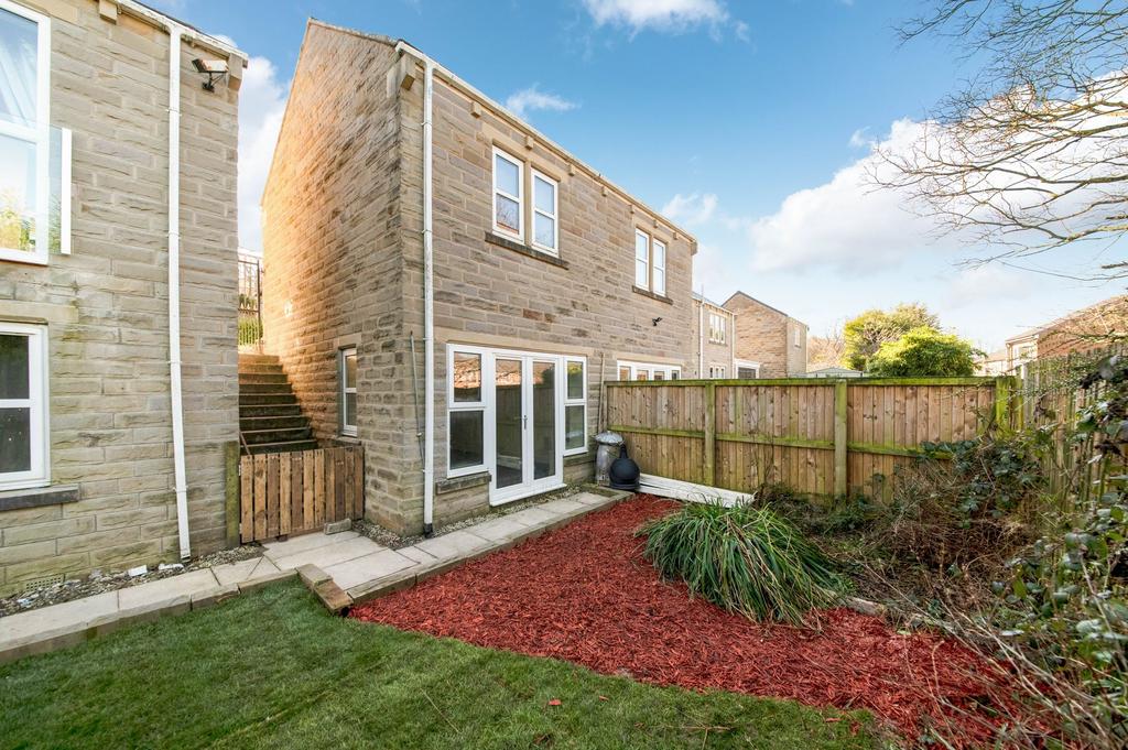 Detached garage block with garden room beneath
