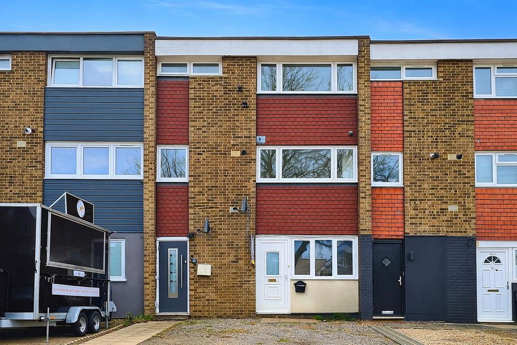 Terraced townhouses with modern cladding.png