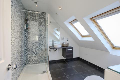 12 Midmoor Road, London, SW19 4JD