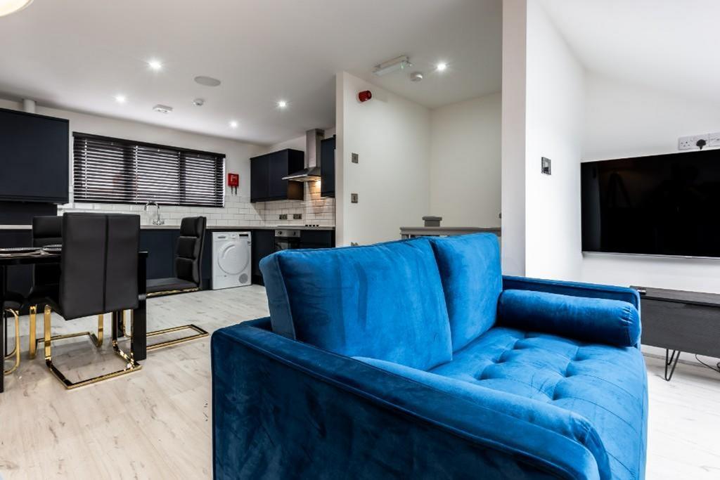 A spacious and stylish modern living room, perf...