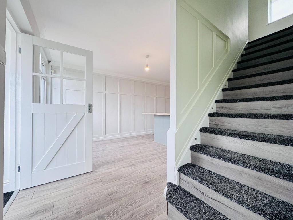 DINING AREA & STAIRS TO THE FIRST FLOOR