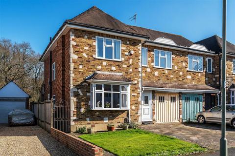 NEWTON WOOD ROAD, ASHTEAD, KT21