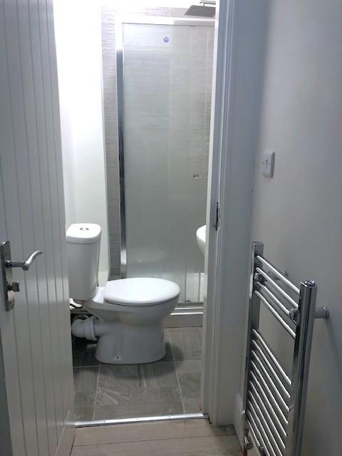 Bathroom 2 - Sleek shower rooms, each fitted...