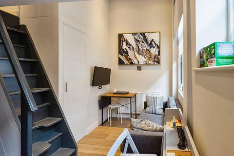 Studio to rent, Golden Square, Soho W1F