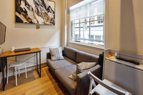 Studio to rent, Golden Square, Soho W1F