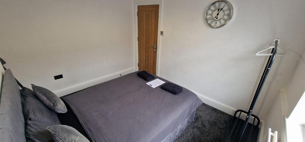 Front Reception/Downstairs Bedroom