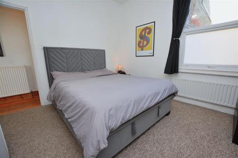 54 Briscoe Road, London, SW19 2AQ