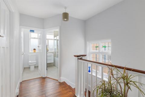 12 Crossway, London, SW20 9JA