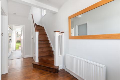 12 Crossway, London, SW20 9JA