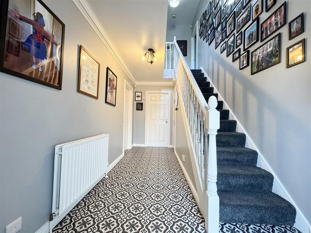 Stairs rising to the first floor