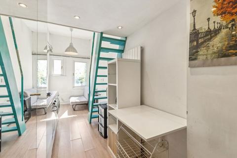 Studio to rent, Gwendwr Road, London W14