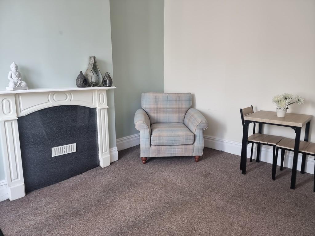 Fireplace armchair table and chairs