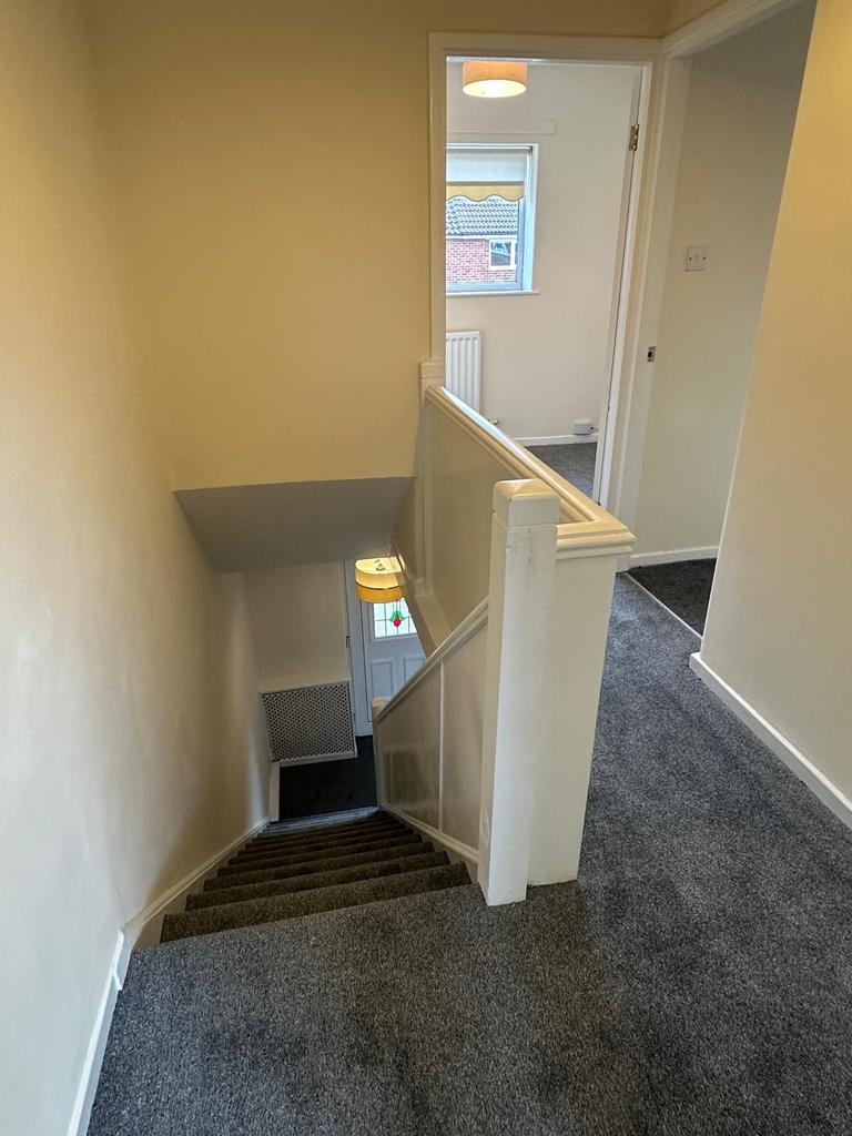 Stairs and Landing area down to hallway