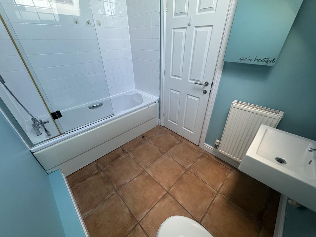 En suite bathroom to bedroom 4
