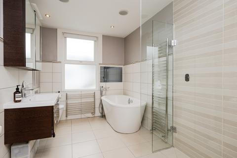 6 Newton Road, London, SW19 3PJ