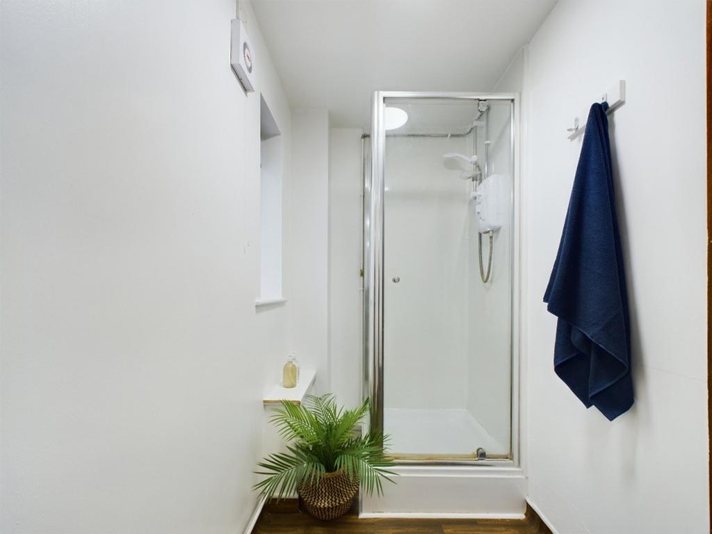 A modern and stylish bathroom featuring a clean...