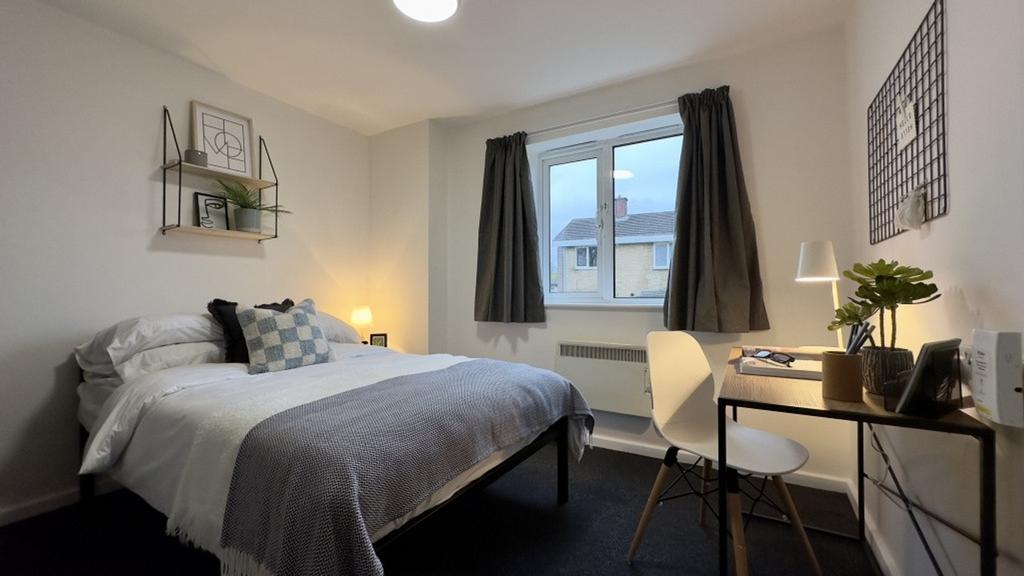 A spacious and inviting large double bedroom fe...