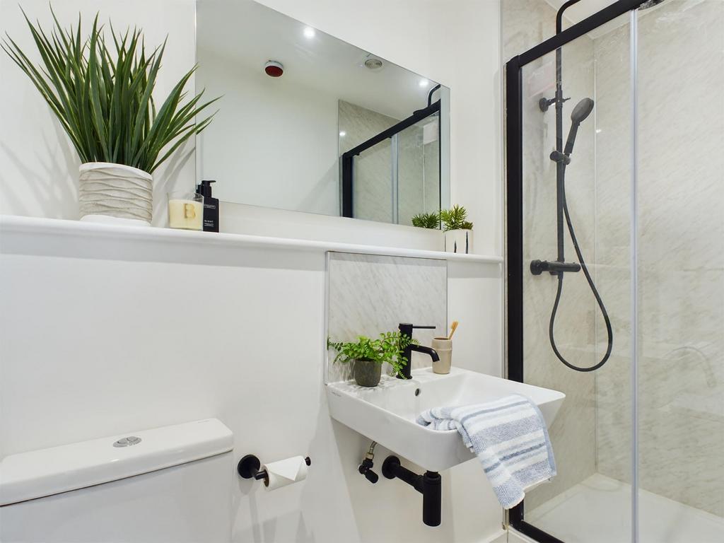 A modern and well-maintained bathroom featuring...