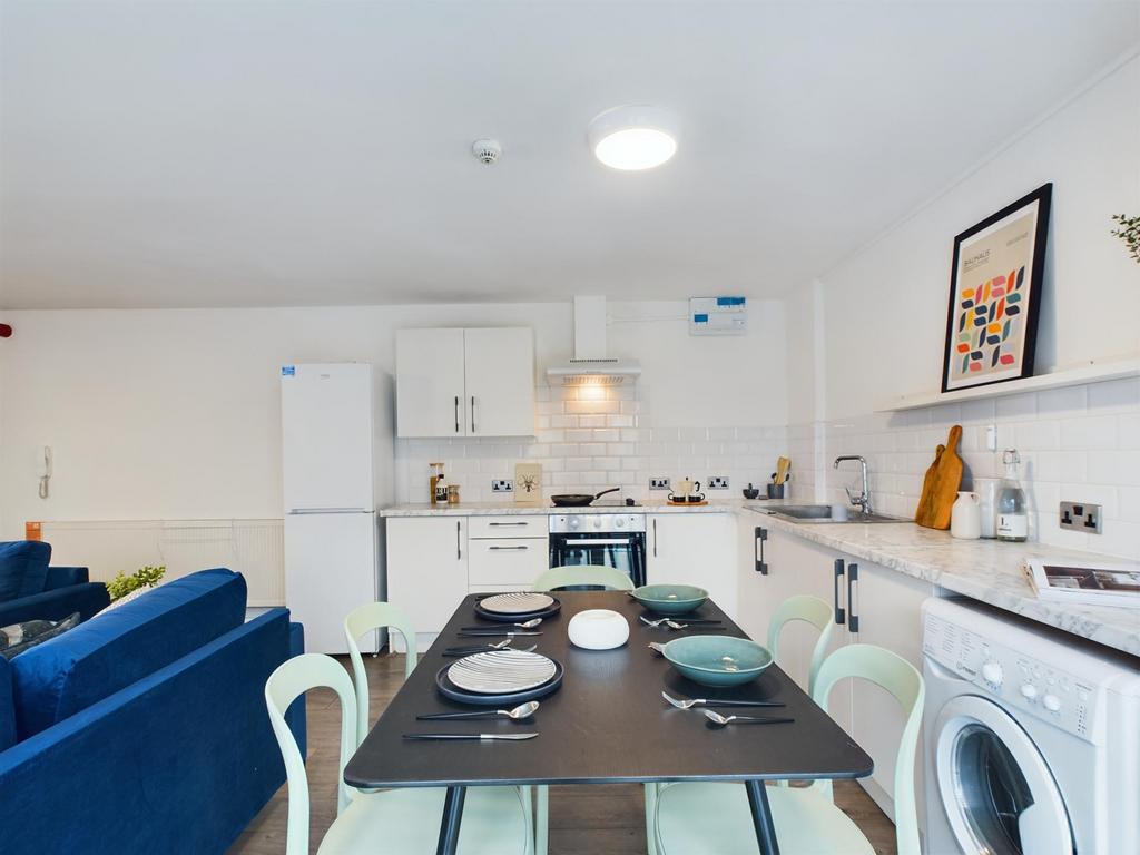 Bright and spacious modern kitchen with ample w...